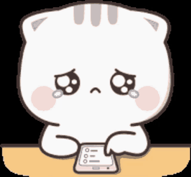 a cartoon cat is sitting at a table looking at a cell phone .