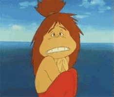a cartoon character with red hair is sitting in front of the ocean and making a sad face