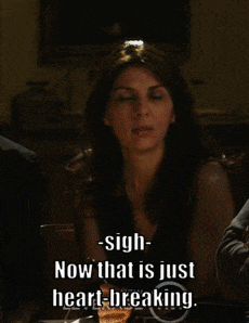 a woman covering her face with her hands with the words " sigh- now that is just heart-breaking "