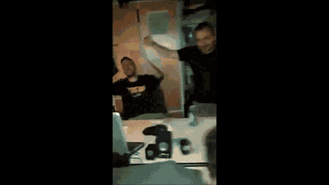 a blurry picture of a person dancing in a room