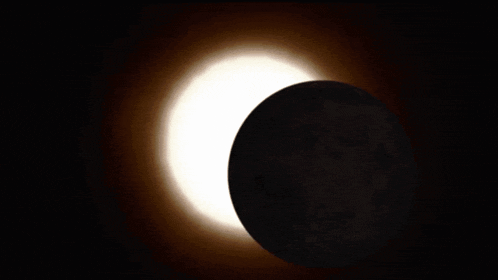 the sun is partially obscured by the moon in an eclipse