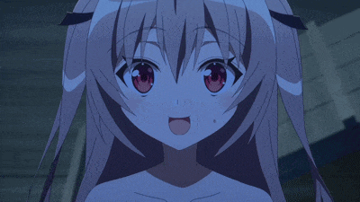 a close up of a girl 's face with a surprised expression
