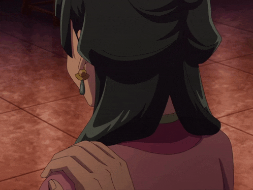a close up of a woman 's ear with earrings
