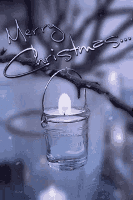 a merry christmas card with a candle hanging from a branch