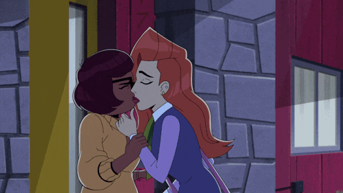 two cartoon characters kissing in front of a brick wall