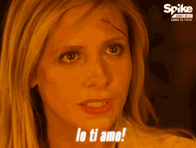 a close up of a woman 's face with the words " lo ti amo " on the bottom