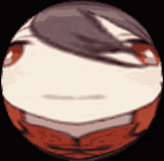a cartoon drawing of a person 's face in a circle with red eyes
