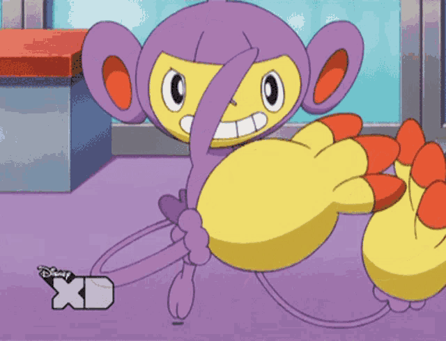 a purple and yellow cartoon character with a xd logo below it