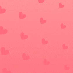 a dragon with hearts on its wings and a heart shaped head