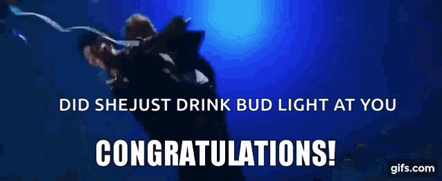 a congratulations gif with two people dancing