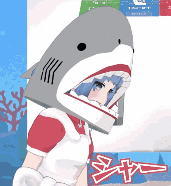 a girl is wearing a shark hat with a shark mouth