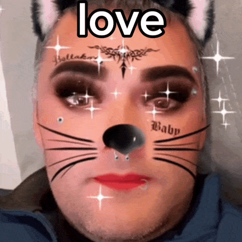 a man with a cat face and the word love written on his face