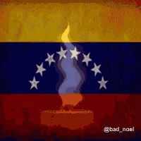 a venezuelan flag with a candle in the middle of it