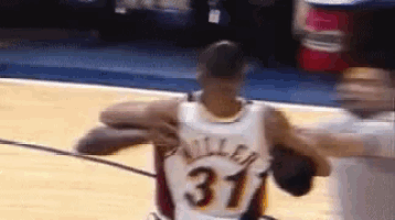 a basketball player wearing a jersey with the number 31