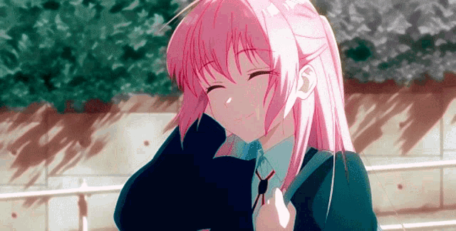 a girl with pink hair is wearing a school uniform and tie