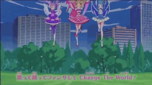 three girls are on a stage with the words change the world