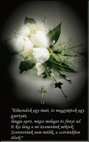 a bouquet of white flowers with a cross in the background