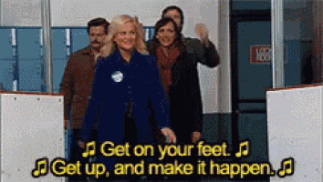 a group of people are walking in a hallway with the words get on your feet and make it happen