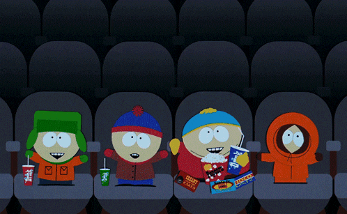 four south park characters are sitting in a movie theater