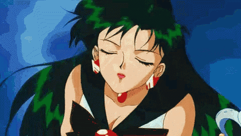 a pixelated image of a girl with green hair
