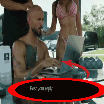 a man sitting at a table with a woman in a bikini behind him and a post your reply icon