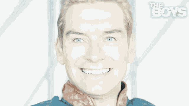 a close up of a man 's face with the words the boys on the bottom right