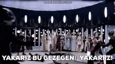 a group of people are standing in a room with the words yakariz bu gezegeni yakariiz