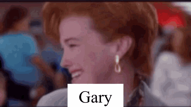 a close up of a woman 's face with the name gary in the corner