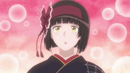 a girl in a kimono with a red bow on her head