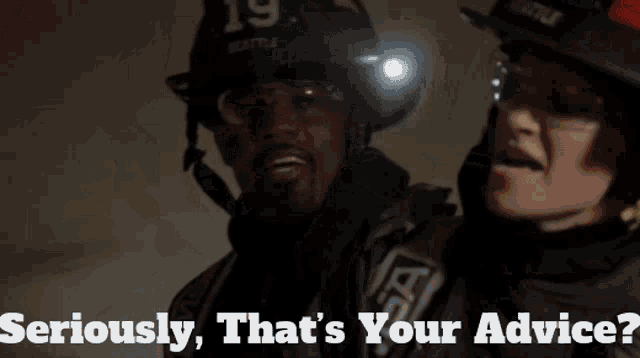 a fireman wearing a helmet with the number 19 on it