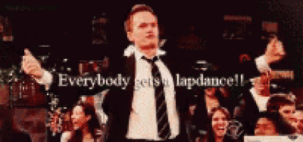 a man in a suit and tie is dancing in front of a crowd with the words everybody gets a lapdance