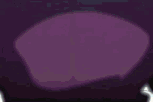a close up of a person 's torso in a purple suit .