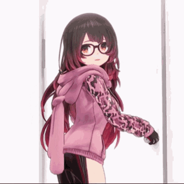 a girl in a pink hoodie is standing next to a door
