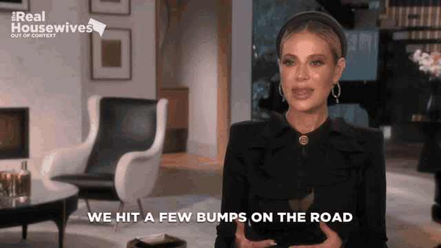 a woman says " we hit a few bumps on the road " in a living room