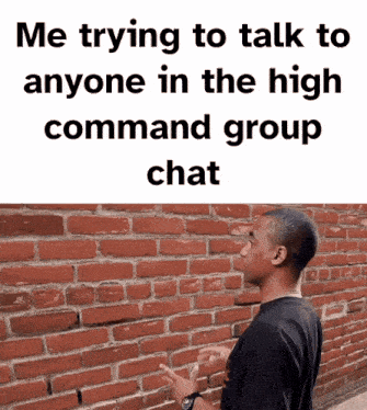 a man is standing in front of a brick wall with a caption that says me trying to talk to anyone
