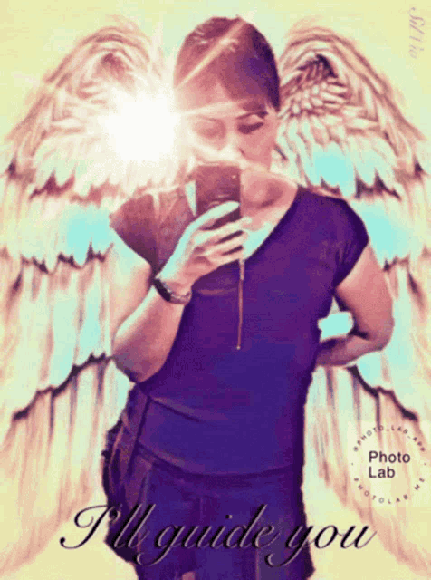 a woman with angel wings taking a selfie with the words " i 'll guide you " below her