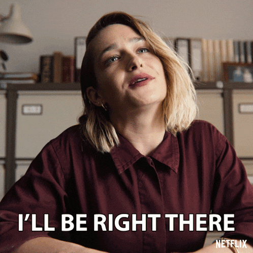 a woman in a maroon shirt says i 'll be right there netflix
