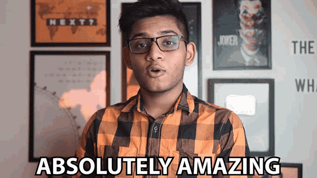 a man in a plaid shirt says " absolutely amazing "