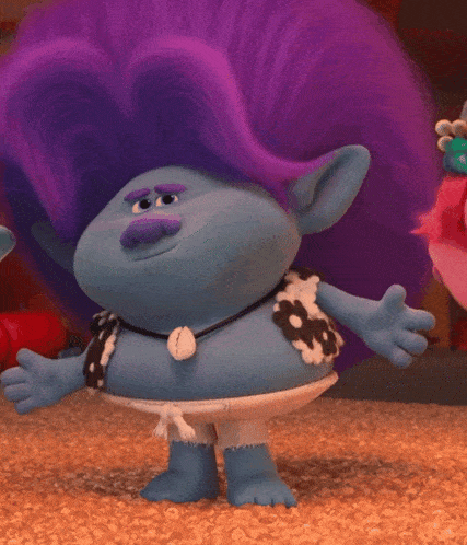 a troll with purple hair is wearing a necklace