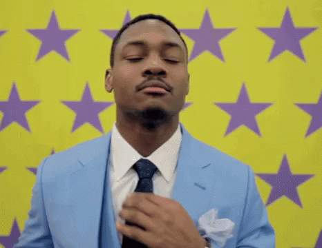 Fixing Tie Stefon Diggs GIF - Fixing Tie Stefon Diggs Nfl GIFs
