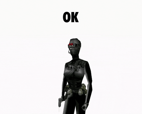 a woman in a black suit is holding a gun with the word ok below her