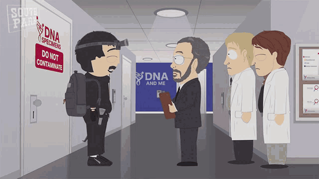 a group of people standing in a hallway with a sign that says dna and me
