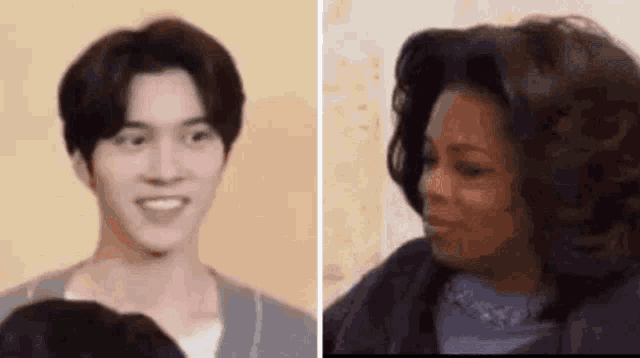 a man and a woman are standing next to each other and the woman is smiling .