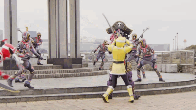 a group of cartoon characters are fighting each other including one wearing a pirate hat and holding a sword