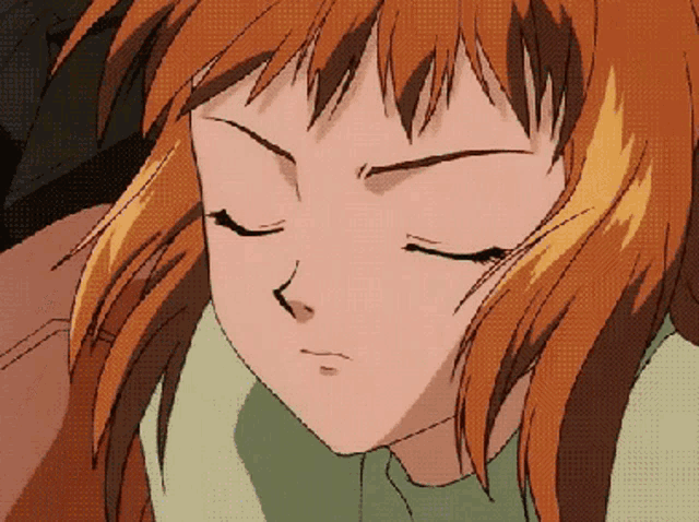 a close up of a girl sleeping with her eyes closed