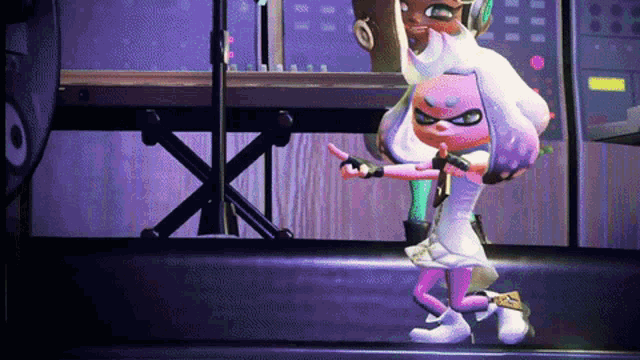 a pink and white cartoon character is dancing in a dark room