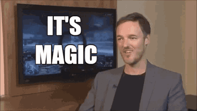 a man in a suit says it 's magic