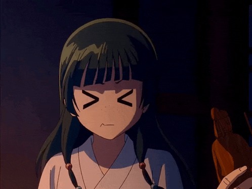 a girl with green hair is making an angry face