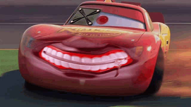a cartoon drawing of a lightning mcqueen car with a big smile on his face