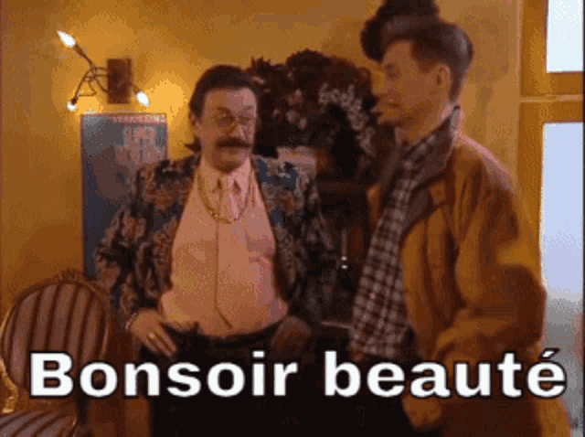 two men standing next to each other with bonsoir beaute written on the bottom right